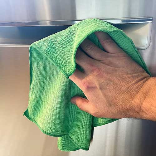 green microfiber cleaning towel