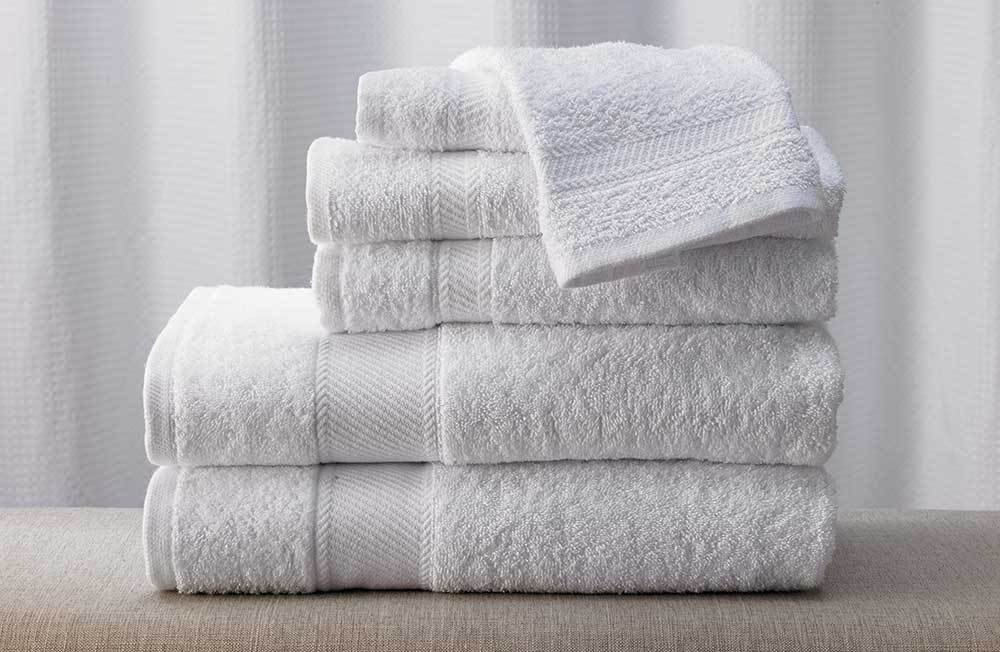 white cotton bath towel